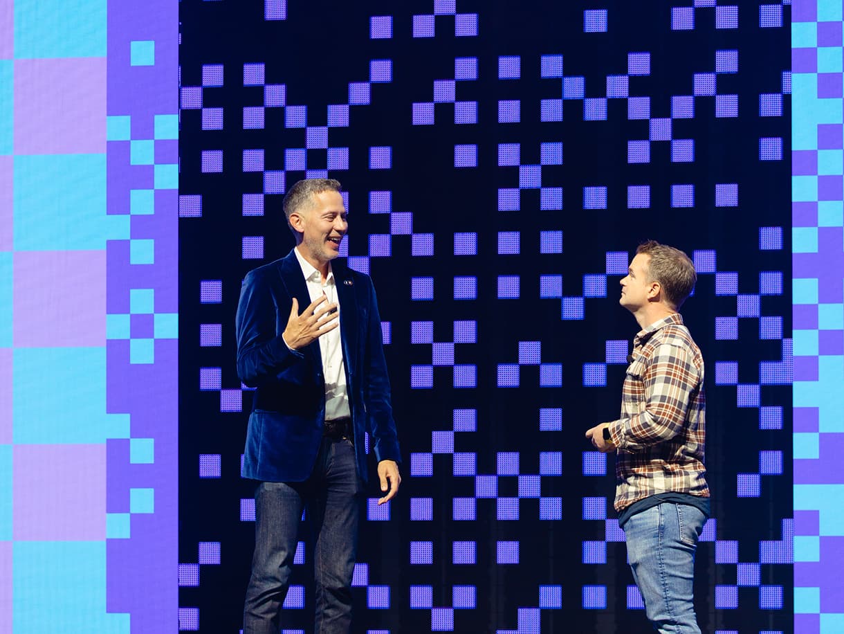 Two speakers in conversation on the dbt Summit 2026 stage